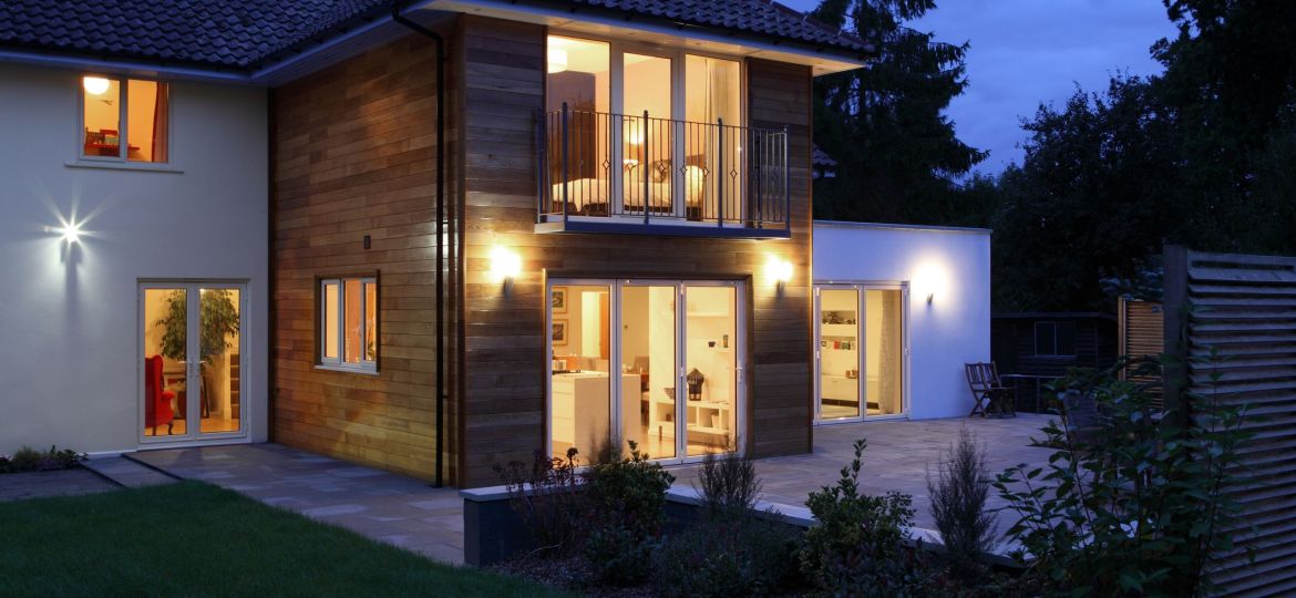 Large house illuminated in the evening